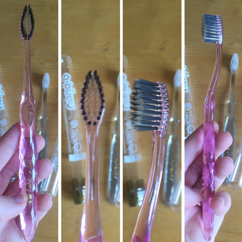 gold and charcoal toothbrush head