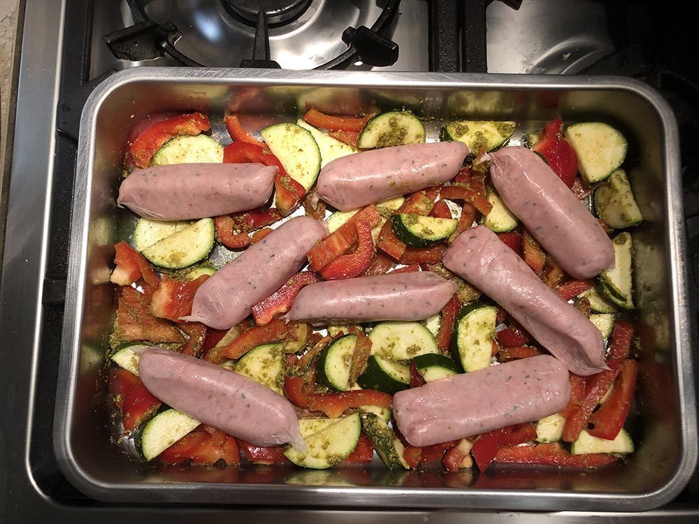 Sausages and Vegetables in a silver tin