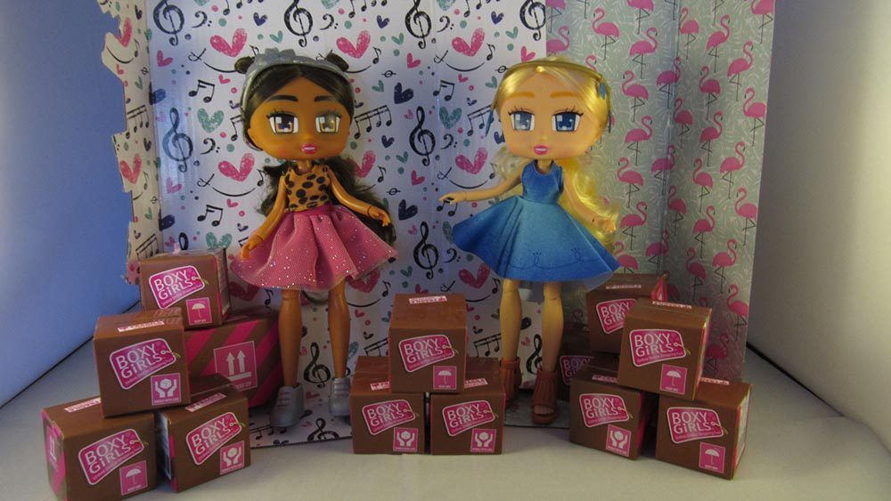 Boxy Girls stood with their carton boxes