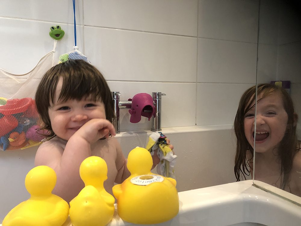 Mia and Lottie playing with their duckys!