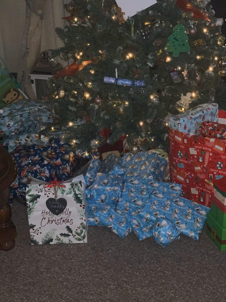 Christmas presents wrapped under the tree