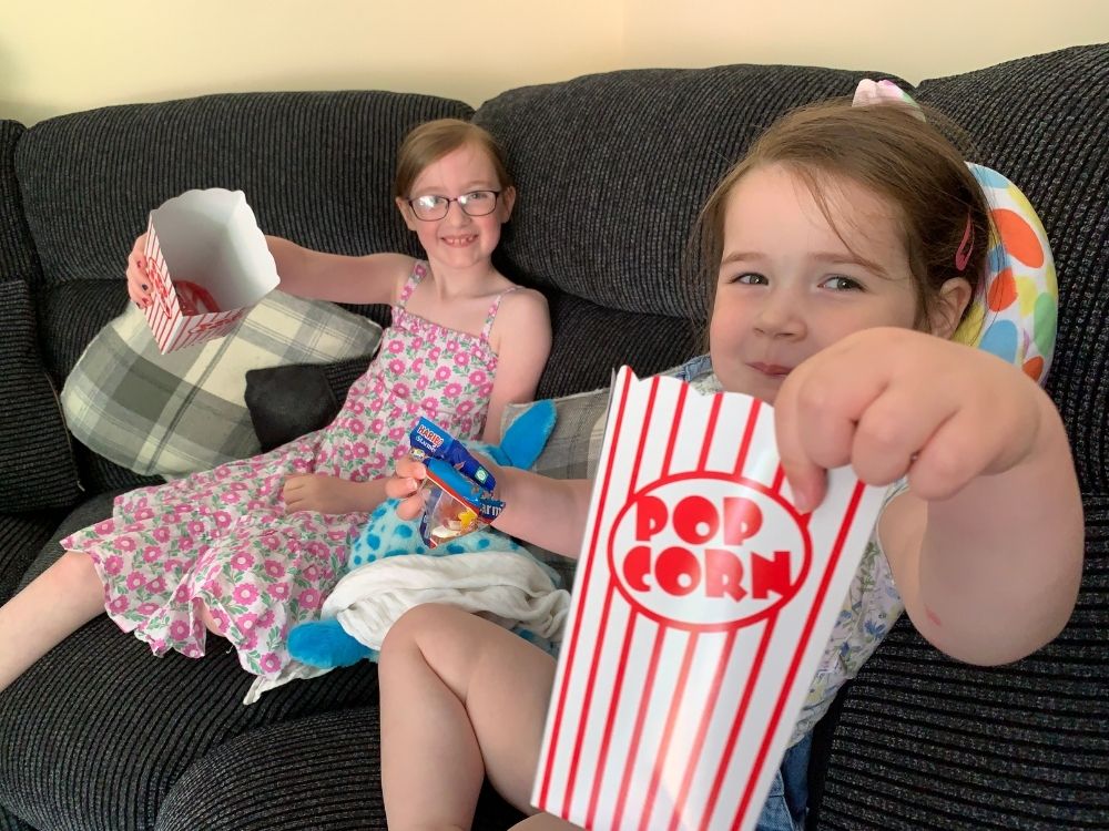 Girls eating popcorn